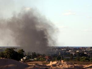 Smoke billows from buildings after the air force from the pro-government forces loyal to Libya's Government of National Unity fired rockets targeting Daesh in Sitre. (AFP/File)
