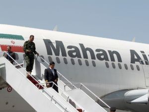 A Mahan Air plane pictured on the tarmac after landing at Sanaa International Airport in the Yemeni capital on March 1, 2015. (AFP Photo/Mohammed Huwais)