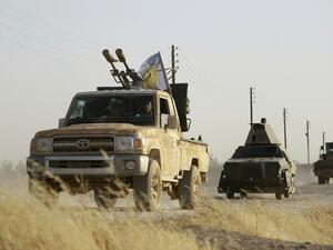 US-backed Kurdish and Arab fighters advance into the Daesh bastion of Manbij, in northern Syria, in June 2016. (AFP/File)