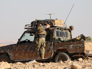 Members of US-backed Kurdish-Arab forces deploy on the frontline, one kilometre from the Syrian town of Ain Issa on Sunday as they launched an offensive on Raqqa.  (AFP/File)