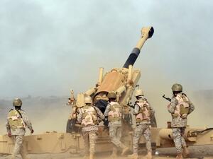 Saudi soldiers from an artillery unit fire shells from a post close to the Saudi-Yemeni border. (AFP/File)