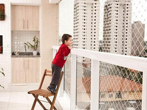 The invention is an inexpensive sensor that alerts parents when their child approaches a balcony or window. (Shutterstock) 