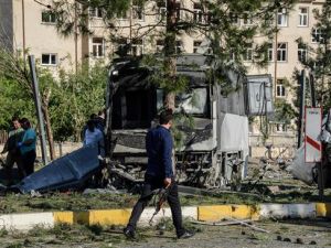 A Turkish plainclothes police office walks on the site of a bomb explosion in Diyarbakir, Turkey, May 10, 2016.  (AFP/File) 