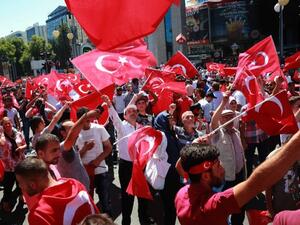 People wave national flags as they march from Kizilay Square to the Turkish General Staff building in Ankara, on July 16, 2016 (AFP/Adem Altan)