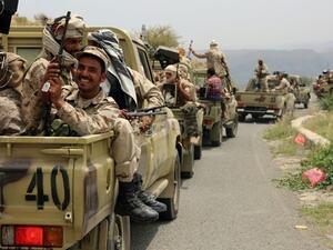 Yemeni fighters loyal to President Abedrabbo Mansour Hadi drive in the Yafa area some 180 kilometres north of the port city of Aden on August 9, 2016. (AFP/File) 