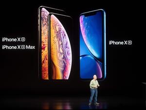 Phil Schiller, Apple senior vice president, discusses his company's iPhone line-up during an event on September 12, 2018, in Cupertino, California.(Photo by NOAH BERGER  AFP)