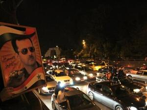 مسيرة مؤيدة للرئيس السوري بشار الأسد. مسيرة مؤيدة للرئيس السوري بشار الأسد.