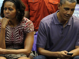 الرئيس الامريكي باراك اوباما وزوجته ميشيل