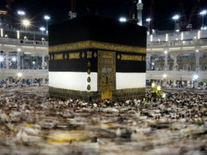 Pilgrims walk counterclockwise around Islam's holiest shrine, the Kaaba, at the Grand Mosque in Mecca, Saudi Arabia (AFP/File Photo)	