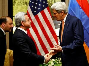 US Secretary of State John Kerry shakes hands with Armenia's President Serzh Sargsyan on May 16, 2016 in Vienna, Austria as the leaders meet for the first time since fighting erupted over Nagorno Karabakh. (AFP/Leonhard Foeger)