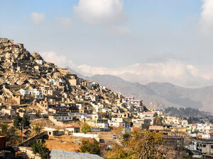 Around 2,000 houses in the dusty, poverty stricken area are painted in bright colours thank stop a new project run by Kabul's municipal authorities. (shutterstock)