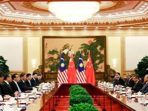 Malaysian and Chinese diplomats meet at the Great Hall of the People in Beijing on August 20, 2018. (AFP/ File)