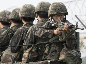 South Korean soldiers ride a military truck on the road leading to the truce village of Panmunjom in the border city of Paju on August 24, 2015. (AFP/ File Photo)