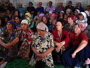 Women in Tajikistan, 2005. A new law has urged Tajiks to "stick to traditional and national clothes." (Wikimedia Commons)