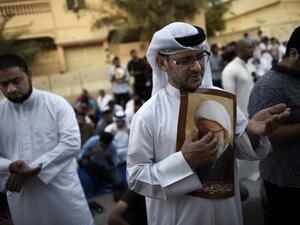 Bahraini demonstrators attend a protest against the revocation of the citizenship of top Bahraini Shia cleric Sheikh Isa Qassim. (AFP/Mohammed Al-Shaikh)