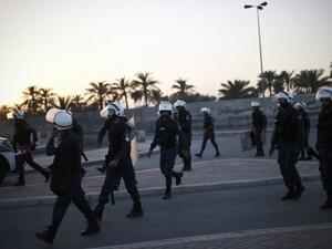 Bahraini forces raided homes in the capital Manama, arresting 10 citizens, amid ongoing protests against the government crackdown on political dissidents. (AFP/ File Photo)