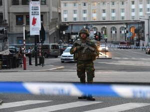 A soldier stands alert in a cordoned off area outside Gare Central in Brussels on June 20, 2017, after an explosion. (AFP/ Emmanuel Dunand) 