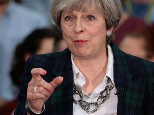 British Prime Minister Theresa May could face cabinet rebellion amid fears from Euroskeptic MPs inside her party that she will keep Britain in the EU’s customs union after Brexit (AFP/File Photo)	