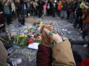 Police dispersed far-right hooligans who disrupted mourners at shrine for victims of Brussels attacks. (AFP/File)