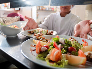 Eat' Bahrain market offering currently includes 80 restaurants, including Michelin-led restaurants CUT by Wolfgang Puck and Masso by Chef Susy Massetti. (Shutterstock)