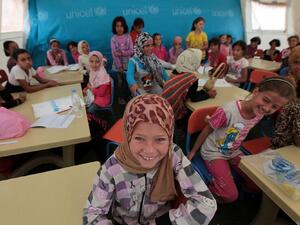 The Education Ministry plans to introduce double shifts at 102 schools where Syrian students are enrolled, bringing the total number of schools working on two shifts to 200. (File photo)