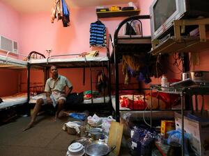 Despite substantial international pressure to reform the treatment of migrant construction workers, reports continue to find workers facing conditions that may amount to those of slavery. (AFP/File)