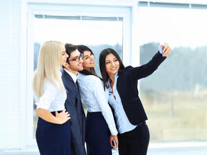 It is easy to form a bond with colleagues over the ruthless world of work. (Shutterstock)