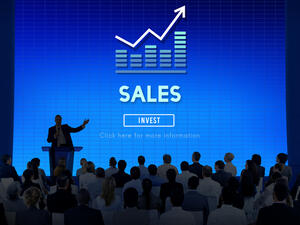 The slides on the screen is only part of your presentation; consider your own appearance and manner. (Shutterstock)