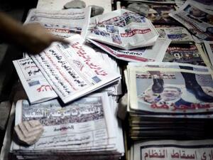 The harsh current economic circumstances forced Al-Ahram printing services to raise costs as most of the materials used in the printing operation are imported and must be paid for in dollars. (AFP/File)