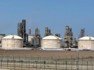 Kuwait is preparing a comprehensive economic program to face the challenges imposed by the drop in oil prices and to achieve a balance in the national economy via diversifying income sources and putting an end to wasting public funds. (AFP/File)