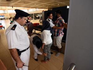 Visitors go through security at Sharm El Sheikh airport. (AFP/File)