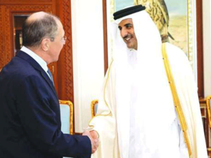 His Highness the Amir Sheikh Tamim bin Hamad al-Thani at his Amiri Diwan Office shakes hand with Russian Foreign Minister Sergey Lavrov. (Gulf Times)