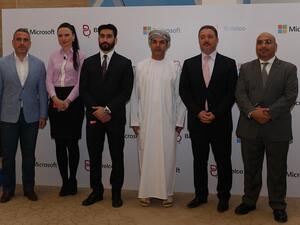 Batelco General Enterprise Division Abderrahmane Mounir and Microsoft Country Manager Bahrain and Oman, Sheikh Saif Hilal Al Hosni with other officials