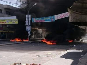 Image showing burning tires in the riots in Madaba (Twitter/@factjoSocial)