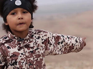 Isa Dare, dubbed "Jihadi Junior", is the four-year-old shown in the latest Daesh propaganda video. (AFP/File)