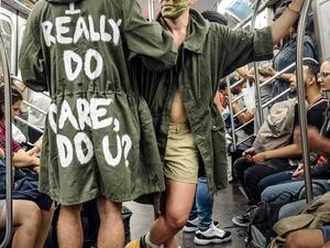 Two subway riders made quite a spectacular fashion statement (Twitter)