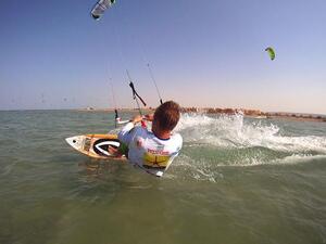 Waiting on security clearance: Mike's ready to ride to his kitesurfing Guinness Record.