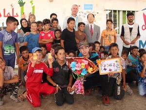 The paintings Ala did with her feet are displayed outside the Mafraq Makani Centre. (Twitter)