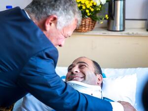 King Abdullah checks on security personnel injured in the Fuheis terrorist attack (Twitter)