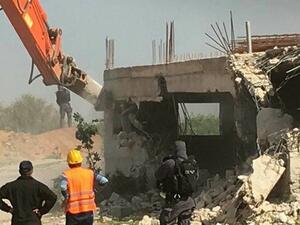 Israeli occupation bulldozers demolished two homes near Al-Khalil (Twitter)
