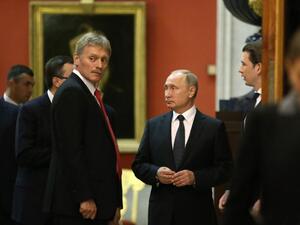 Dmitry Peskov (left), a spokesperson for President Vladimir Putin (Twitter)