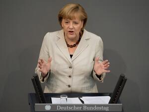 German Chancellor Angela Merkel makes a speech on the outcome of last week's G8 summit and the EU summit beginning in Brussels at the Bundestag (Johannes Eisele / AFP)