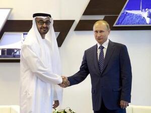 الشيخ محمد بن زايد آل نهيان ولي عهد أبوظبي (إلى اليمين) مع الرئيس الروسي فلاديمير بوتين
