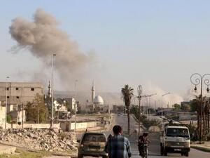 دخان متصاعد إثر ضربة جوية على حلب 
