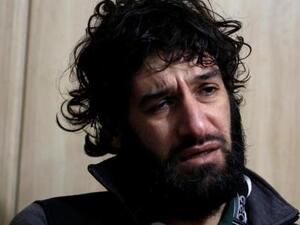 غفار عبد الرحمن أحد مسلحي تنظيم الدولة الإسلامية يتحدث لصحفيي رويترز في مقابلة في سجنه في السليمانية بإقليم كردستان في شمال العراق

