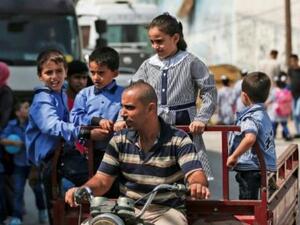 تلاميذ يتوجهون الى مدرسة تابعة للاونروا في غزة
