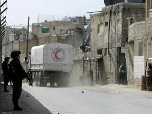 قافلة المساعدات إلى الغوطة تغادر قبل اتمام إفراغ حمولتها