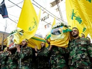 عناصر من حزب الله يشيعون في بيروت قياديا ومقاتلا سقطا في سوريا
