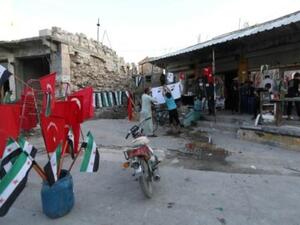 مدينة معرة النعمان في محافظة ادلب تظهر اعلاما لفصائل سورية ومعارضة واخرى لتركيا

