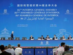 مندوبون يحضرون الجمعية العامة للانتربول في بكين يوم الأربعاء

